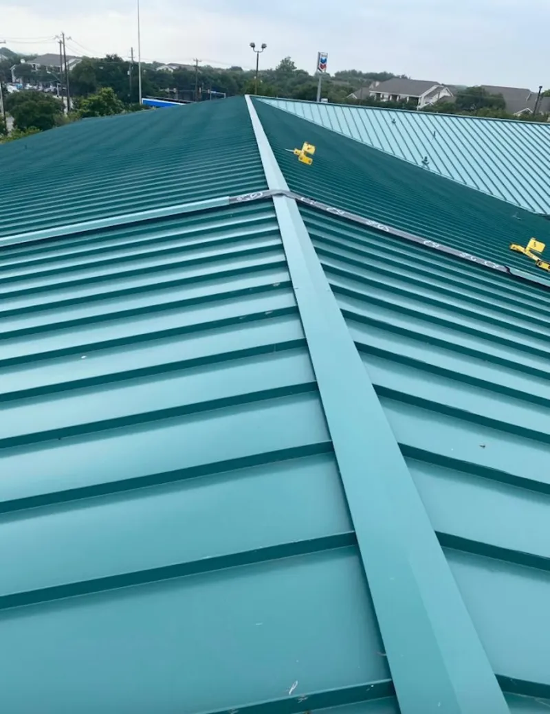 Green commercial metal roof ridge and valley for Metal Roof Repair in Avocado Heights
